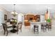 Kitchen boasts granite countertops, wood cabinets, and stainless steel appliances at 24087 Santa Inez Rd, Punta Gorda, FL 33955