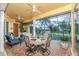 Covered lanai with seating and pool view at 24087 Santa Inez Rd, Punta Gorda, FL 33955