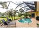 Inviting screened pool and patio area, perfect for relaxation at 24087 Santa Inez Rd, Punta Gorda, FL 33955