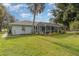 House exterior and spacious backyard at 2931 S Cranberry Blvd, North Port, FL 34286