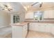 Modern kitchen with white cabinets and granite countertops at 2931 S Cranberry Blvd, North Port, FL 34286