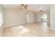 Open living space with tile floors and multiple ceiling fans at 2931 S Cranberry Blvd, North Port, FL 34286