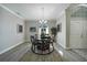 Bright dining room featuring a round table and chandelier at 4767 Maurbach Ter, North Port, FL 34286