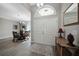 Elegant entryway with double doors and a decorative rug at 4767 Maurbach Ter, North Port, FL 34286