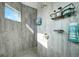 Large walk-in shower with multiple shower heads at 4767 Maurbach Ter, North Port, FL 34286