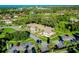 Aerial view of condo community with lush landscaping and parking at 1515 Forrest Nelson Blvd # G102, Port Charlotte, FL 33952