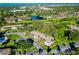 Condo community nestled in a lush landscape with a pond at 1515 Forrest Nelson Blvd # G102, Port Charlotte, FL 33952