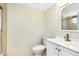 Small bathroom with white vanity, toilet, and shower at 1515 Forrest Nelson Blvd # G102, Port Charlotte, FL 33952