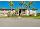 Building exterior showcasing landscaping and a welcoming entrance at 1515 Forrest Nelson Blvd # G102, Port Charlotte, FL 33952
