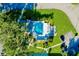 Community pool with lounge chairs and surrounding landscaping at 1515 Forrest Nelson Blvd # G102, Port Charlotte, FL 33952