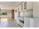 Kitchen with white cabinets and light countertops at 1507 Lavilla Rd, Punta Gorda, FL 33950