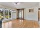 Spacious living room with hardwood floors and large windows at 1507 Lavilla Rd, Punta Gorda, FL 33950