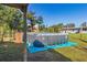 Above ground pool in backyard, ready for summer fun at 1507 Lavilla Rd, Punta Gorda, FL 33950