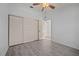 Bedroom with ample closet space and wood-look floors at 1512 Rio De Janeiro Ave # 327, Punta Gorda, FL 33983