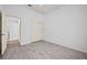 Bright bedroom with wood-look floors and laundry access at 1512 Rio De Janeiro Ave # 327, Punta Gorda, FL 33983