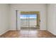Living room with sliding doors leading to a balcony at 1512 Rio De Janeiro Ave # 327, Punta Gorda, FL 33983