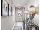 Bright entryway with decorative lamps and art at 107 Santarem Cir, Punta Gorda, FL 33983
