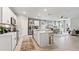 Modern kitchen with island and stainless steel appliances at 107 Santarem Cir, Punta Gorda, FL 33983
