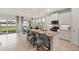 Spacious kitchen with island, stainless steel appliances, and granite countertops at 16130 Highgate St, Port Charlotte, FL 33953