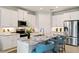 Modern kitchen featuring stainless steel appliances and granite countertops at 16130 Highgate St, Port Charlotte, FL 33953