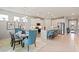 Open concept kitchen and dining area with modern finishes and ample natural light at 16130 Highgate St, Port Charlotte, FL 33953