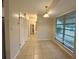 Simple dining area with tile floors and large window at 22180 Midway Blvd, Port Charlotte, FL 33952