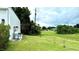 Spacious backyard and lush greenery at 3140 Sweet Gum Dr, Punta Gorda, FL 33982