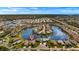 Amazing aerial shot shows lake community with home pin indicated, lakefront and the inter-coastal waterway at 24723 Rio Villa Lakes Cir, Punta Gorda, FL 33950