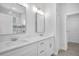 Bathroom with double vanity and marble shower at 13164 Amaryllis Cir, Port Charlotte, FL 33981