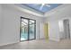 Bright bedroom with access to the pool and bathroom at 13164 Amaryllis Cir, Port Charlotte, FL 33981