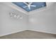 Bedroom with light walls and blue ceiling at 13164 Amaryllis Cir, Port Charlotte, FL 33981