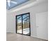 Bedroom with sliding doors opening to the pool area at 13164 Amaryllis Cir, Port Charlotte, FL 33981