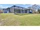 Single-story home with large screened patio area at 13164 Amaryllis Cir, Port Charlotte, FL 33981