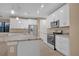 Modern kitchen with stainless steel appliances and granite countertops at 13164 Amaryllis Cir, Port Charlotte, FL 33981