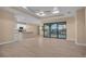 Bright living area with sliding glass doors leading to the pool and lanai at 13164 Amaryllis Cir, Port Charlotte, FL 33981