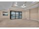 Spacious living room showcasing a view of the pool and lanai at 13164 Amaryllis Cir, Port Charlotte, FL 33981