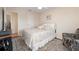 Bedroom with a comfy chair and window looking out to the yard at 2615 Rio Plato Dr, Punta Gorda, FL 33950