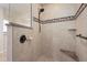 Large walk-in shower with tiled walls and pebble floor at 2615 Rio Plato Dr, Punta Gorda, FL 33950