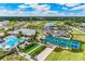 Aerial view of community with pool, pickleball, bocce ball at 1502 Mableton Dr, Port Charlotte, FL 33953