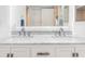 Bathroom with double vanity, marble countertop, and modern chrome fixtures at 175 Kings Hwy # 718, Punta Gorda, FL 33983