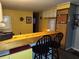 Cozy kitchen features a breakfast bar and ample cabinetry at 5524 Holiday Park Blvd, North Port, FL 34287
