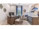 Spacious home office with built-in desk and stylish decor at 1051 Adalia Ter, Port Charlotte, FL 33953