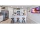 Modern kitchen with island, stainless steel appliances, and stylish decor at 1051 Adalia Ter, Port Charlotte, FL 33953