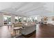 Large community room with seating, kitchenette and pool view at 1425 Powell Valley Dr, Port Charlotte, FL 33953