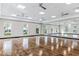Bright and spacious dance studio with hardwood floors and large mirrors at 1425 Powell Valley Dr, Port Charlotte, FL 33953