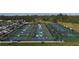 Aerial view of numerous pickleball courts in use at 1 Colony Point Dr # B9, Punta Gorda, FL 33950