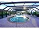 Community pool with covered seating area at 1 Colony Point Dr # B9, Punta Gorda, FL 33950
