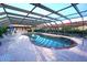 Relaxing community pool under a covered patio at 1 Colony Point Dr # B9, Punta Gorda, FL 33950
