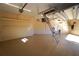 Large garage featuring overhead storage, shelving and a pull-down ladder at 3507 Terin Ct, Punta Gorda, FL 33950