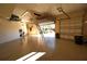 Bright and spacious garage with open door, showing backyard access at 3507 Terin Ct, Punta Gorda, FL 33950